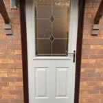 Composite Endurance "Snowdon" door in pearlgrey and rosewood frame with "fabian" glass